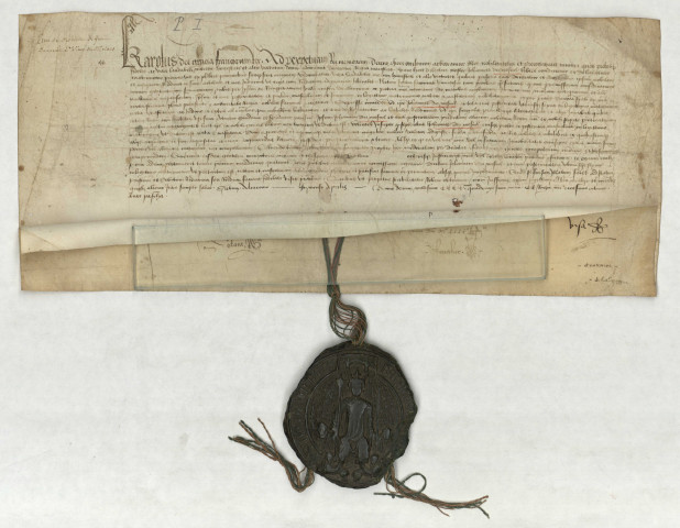Lettres patentes du roi Charles VII anoblissant Jean du Mesnil (échevin de la ville d'Alençon) et sa descendance (avril 1449), contresignées du secrétaire d'État Etienne Chevalier : parchemin, grand sceau en cire verte sur lacs de soie verte et rouge.