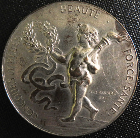 Concours de bébés (1904), récompense : médaille argentée (diam : 3.6 cm), acquisition 2020, AMA.